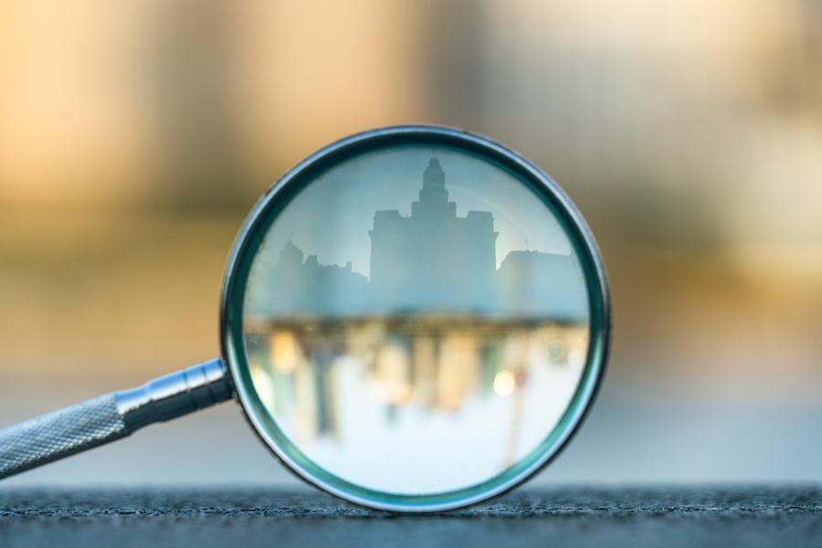 the bund of Shanghai reflected in a magnifying glass #1 Photograph by Fanjianhua