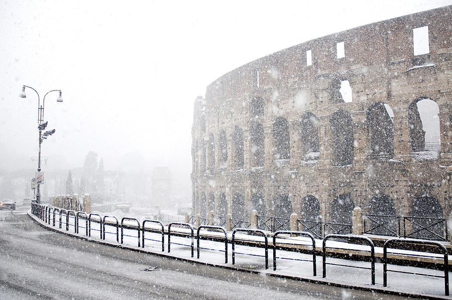 The Colosseum under heavy snow #2 Photograph by Fabrizio Troiani