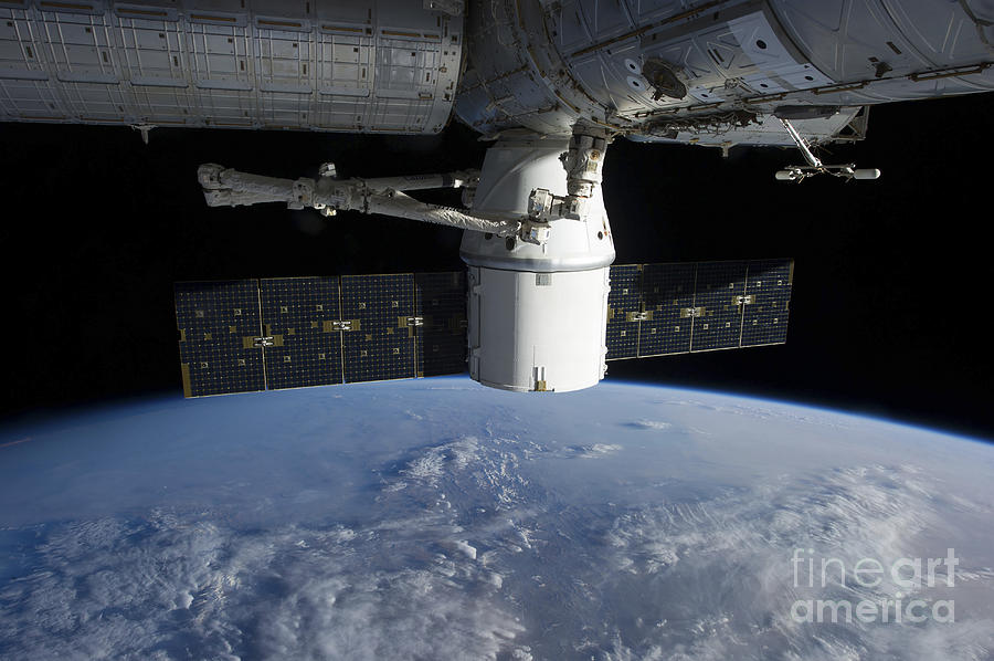 The Docking Of Spacex Dragon Photograph