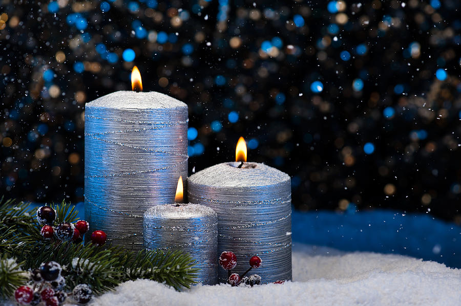 Three Silver Candles in snow  #1 Photograph by U Schade