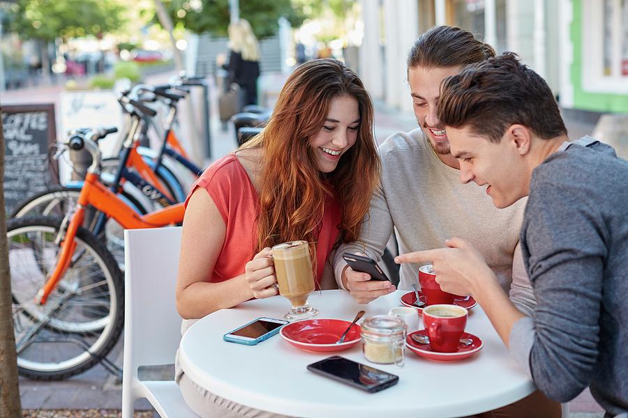 Three Young Friends With Smartphone #1 Photograph by Science Photo Library Three Young Friends With Smartphone #1 Photograph by Science Photo Library