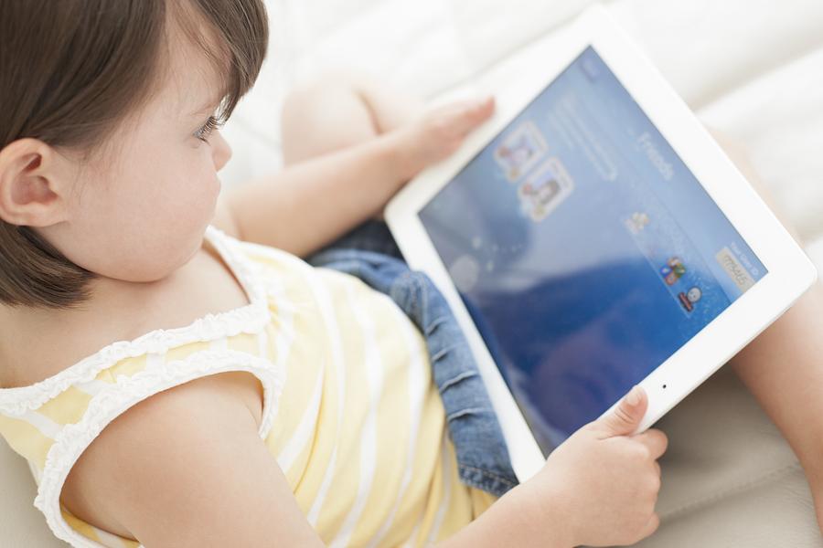 Apple Photograph - Toddler using a tablet computer #1 by Science Photo Library