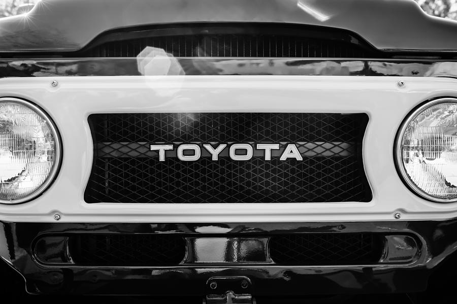 Black And White Photograph - Toyota Land Cruiser Grille Emblem  #1 by Jill Reger