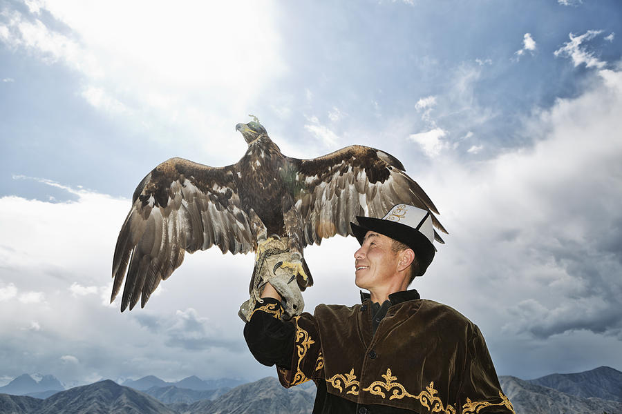 Traditional Kyrgyz Hunter Holding Eagle #1 Photograph by Tunart