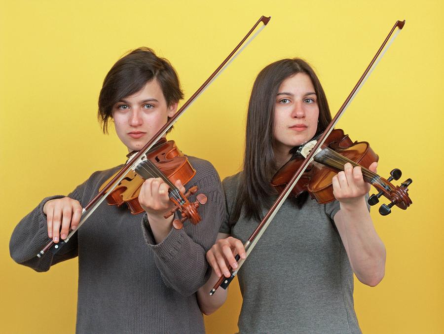 Twins Playing Violins #1 Photograph by Alex Bartel/science Photo Library