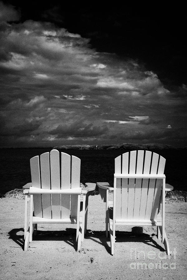 Holiday Photograph - Two Empty Sun Loungers On Private Beach Islamorada Florida Keys Usa #1 by Joe Fox