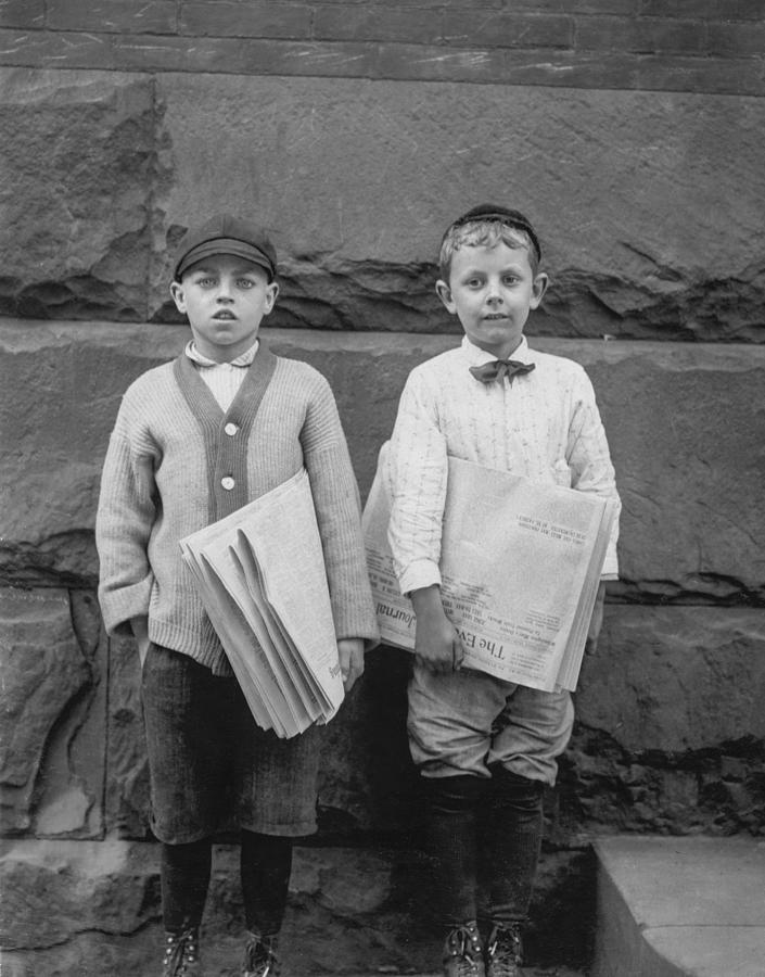 Black And White Photograph - Two newspaper boys #1 by Aged Pixel