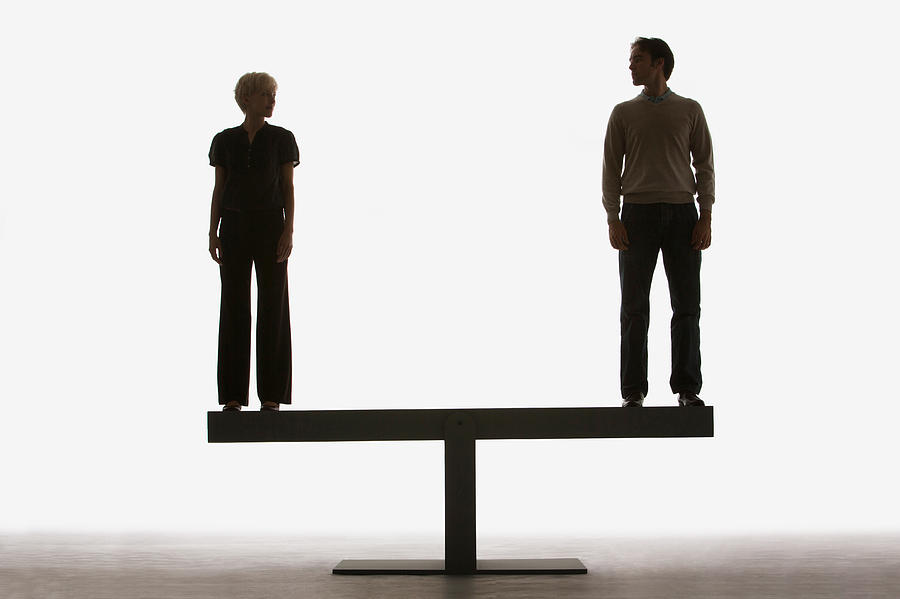Two people standing on top of a plank #1 Photograph by Martin Barraud