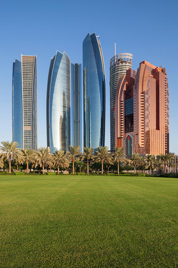 City Photograph - Uae, Abu Dhabi Etihad Towers #1 by Walter Bibikow
