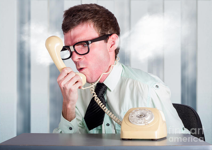 Unhappy Nerd Businessman Yelling Down Retro Phone Photograph by Jorgo ...