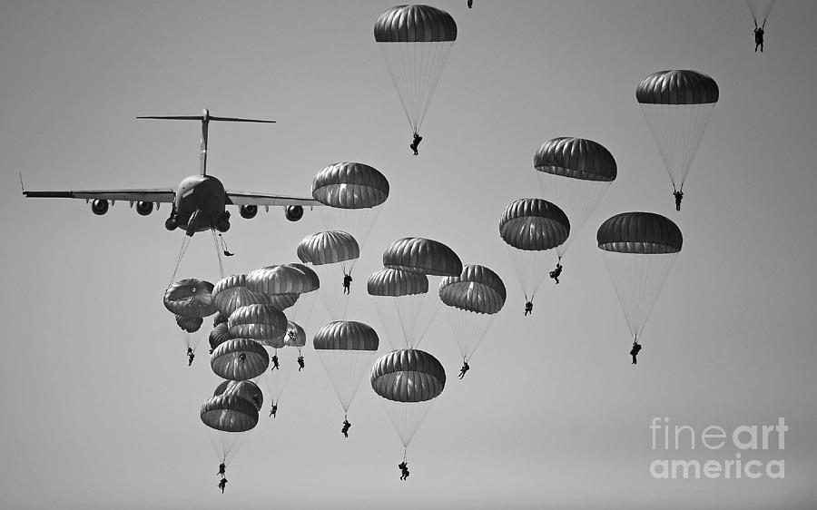Airplane Photograph - U.s. Army Paratroopers Jumping #1 by Stocktrek Images