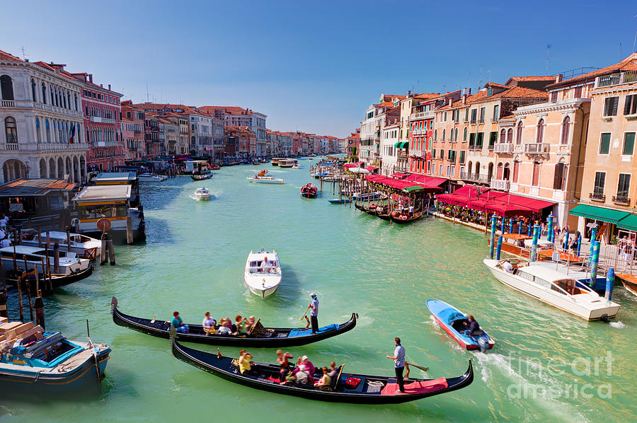 Venice Italy Gondola with tourists floats on Grand Canal #1 Photograph by Michal Bednarek
