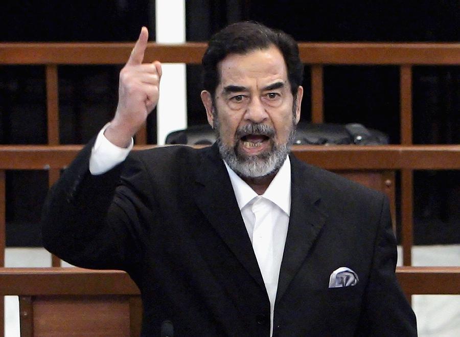 Verdicts Delivered In Saddam Hussein Trial Photograph by Pool Verdicts Delivered In Saddam Hussein Trial Photograph by Pool