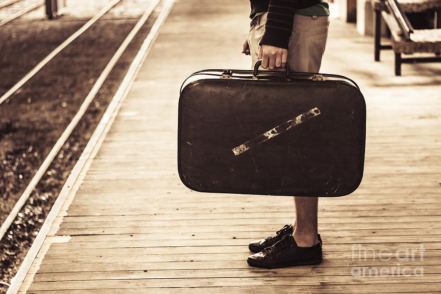 Vintage man with old luggage at train station  #1 Photograph by Jorgo Photography