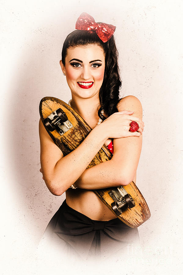 Vintage portrait of a pin-up model with skateboard #1 Photograph by Jorgo Photography