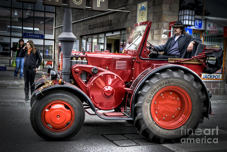 Vintage tractor on market day #1 Photograph by Dan Yeger