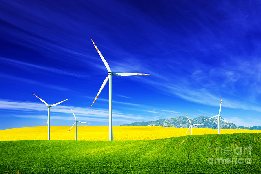 Wind turbines on spring field #1 Photograph by Michal Bednarek