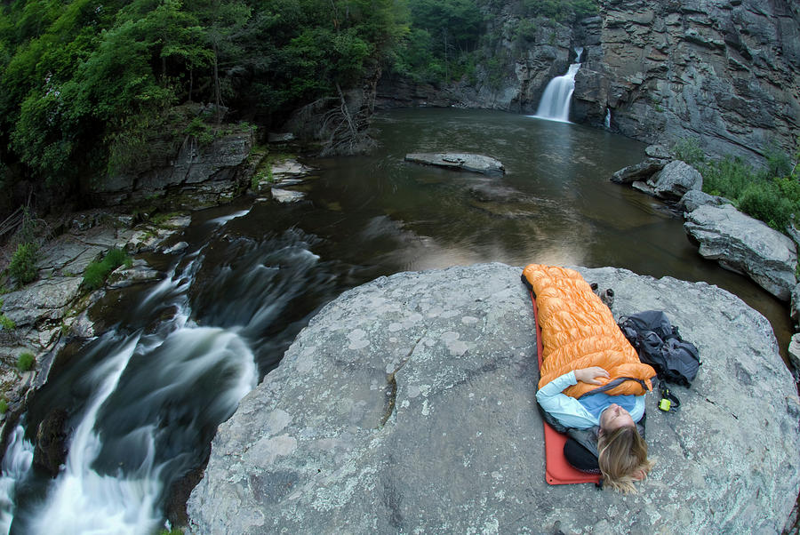 Waterfall Photograph - Woman Camping On Rock Below Linville #1 by Kennan Harvey