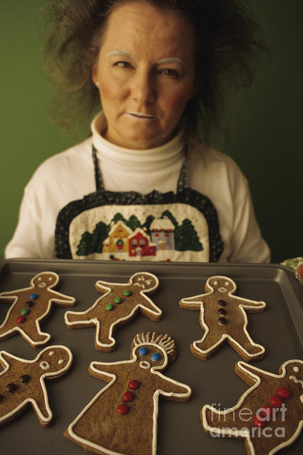 Woman Cooking Gingerbread Cookies #1 Photograph by Jim Corwin