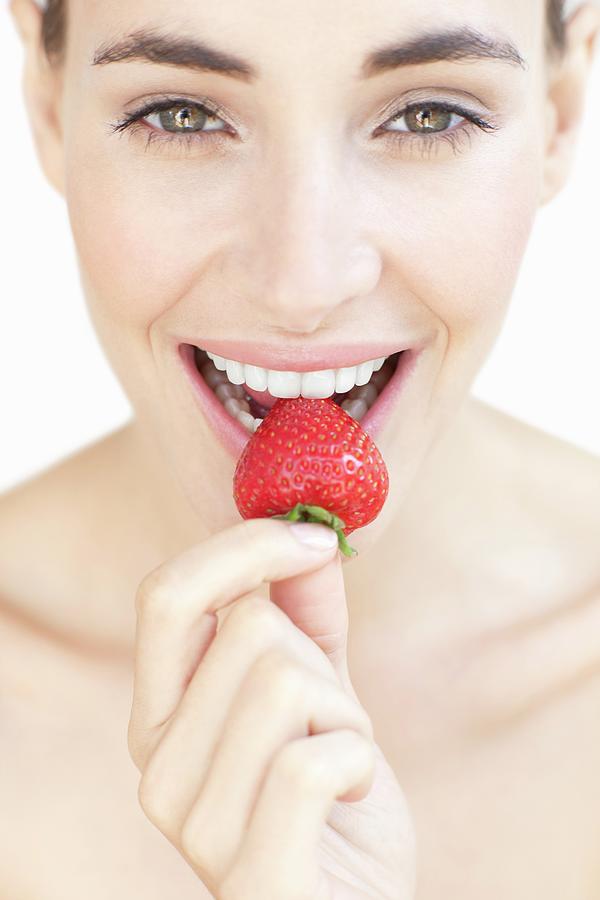 Long-haired Woman Eating Strawberries Stock Image - Image of adult ...