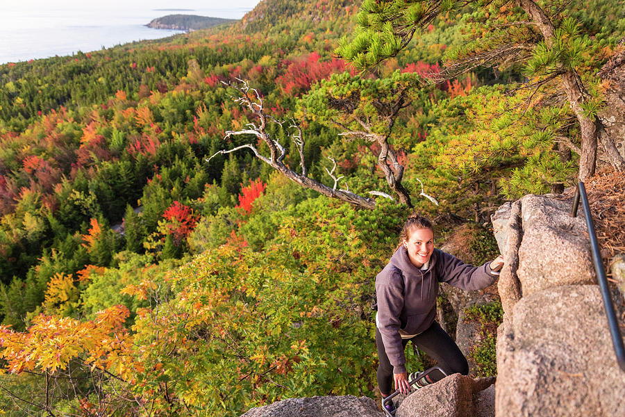 Acadia National Park Photograph - Woman Hiking Beehive In Fall In Acadia #1 by Jerry Monkman