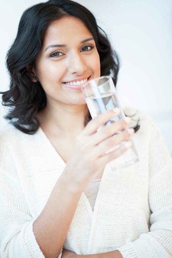 Woman Holding Water #1 Photograph by Science Photo Library Woman Holding Water #1 Photograph by Science Photo Library