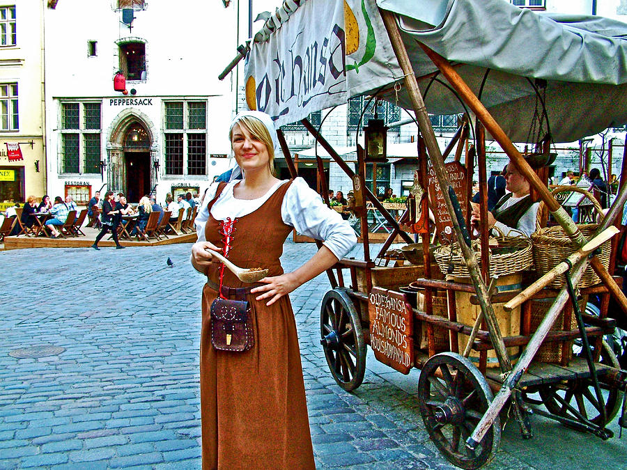 Estonia Photograph - Woman Selling Sweetened Almonds in Old Town Tallinn-Estonia #1 by Ruth Hager