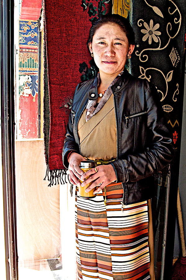 Woman Shopkeeper in Front of a Clothing Store in Shigatse-Tibet ...