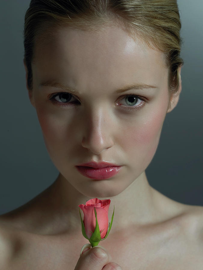 Rose Photograph - Woman Smelling A Rose #1 by Kate Jacobs/science Photo Library