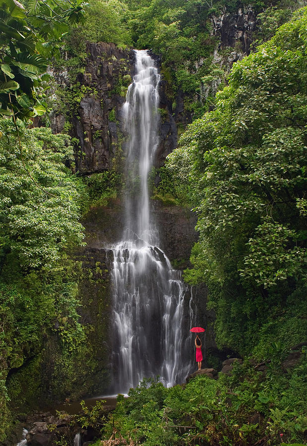 Woman with umbrella at Wailua Falls #1 Photograph by M Swiet Productions
