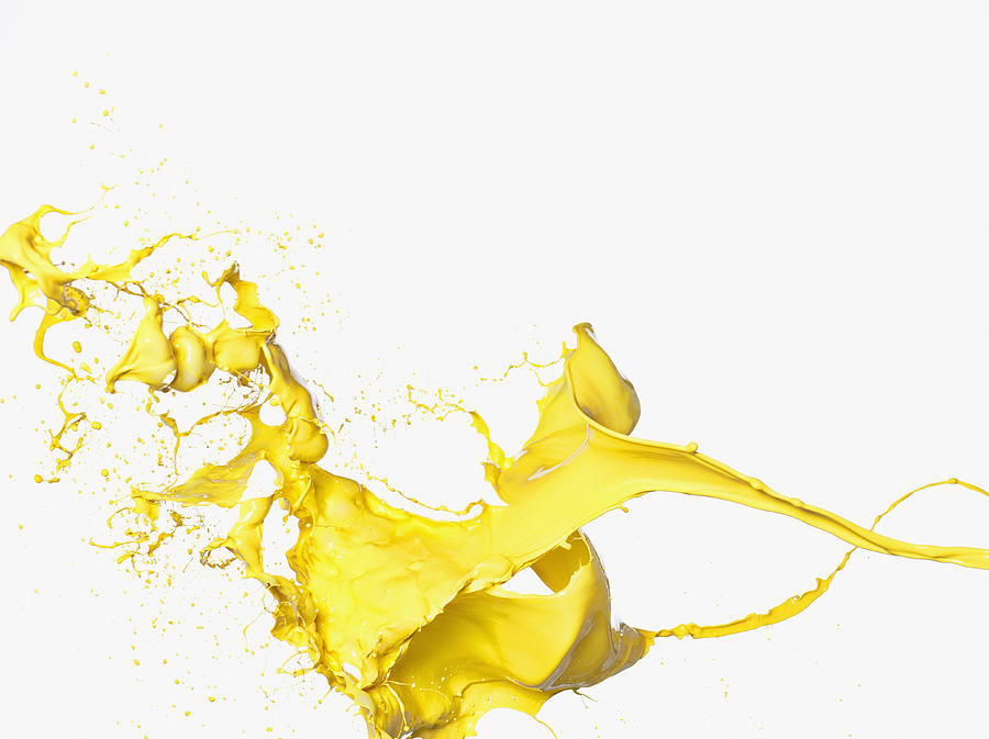 Yellow paint splashing Photograph by Robert Daly