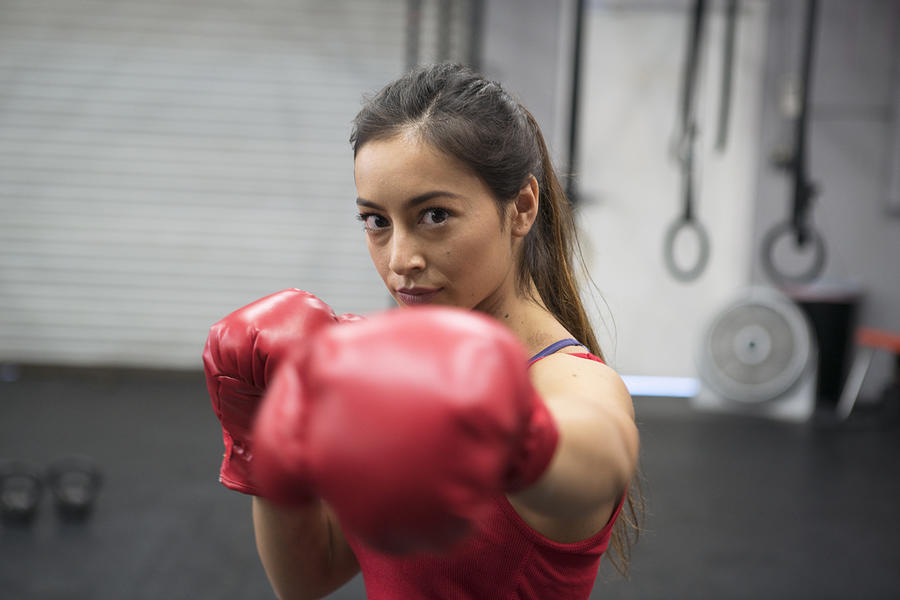 Young woman boxing in a gym #1 Photograph by Eternity in an Instant