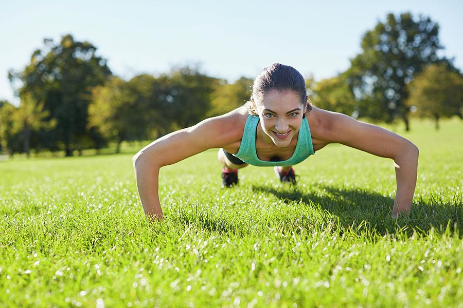 Young Woman Doing Push-up Photograph by Science Photo Library - Fine ...