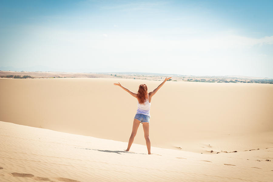 Beautiful woman in sand dunes Photograph by Nikita Buida - Fine Art America