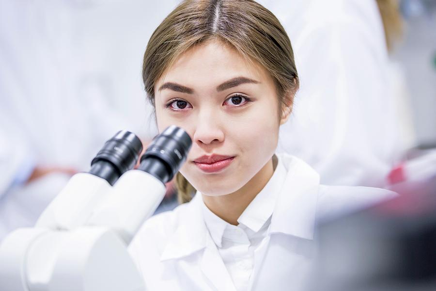 Scientist Using Microscope #10 by Science Photo Library