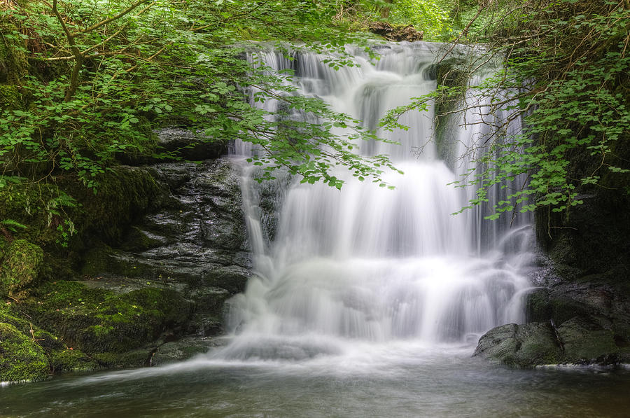 Tree Photograph - Stunning waterfall flowing over rocks through lush green forest  #10 by Matthew Gibson