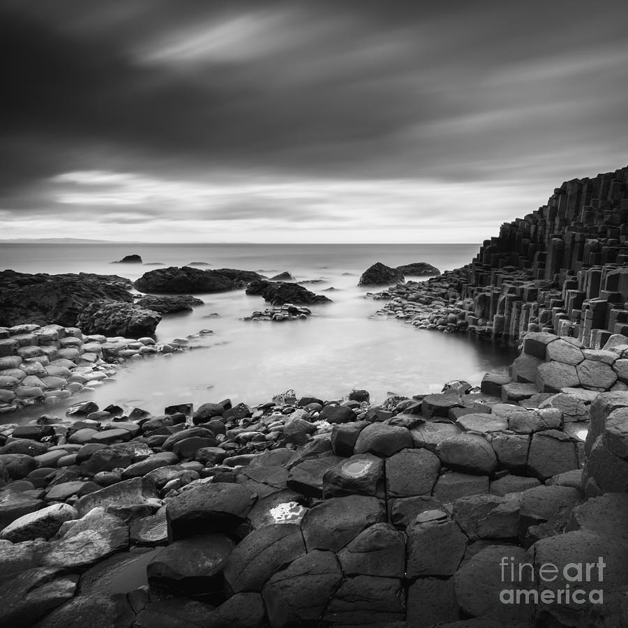 Black And White Photograph - Giants Causeway #11 by Pawel Klarecki