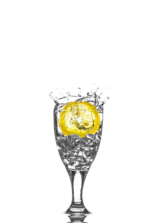 Slice of lemon in Glass #11 Photograph by Peter Lakomy