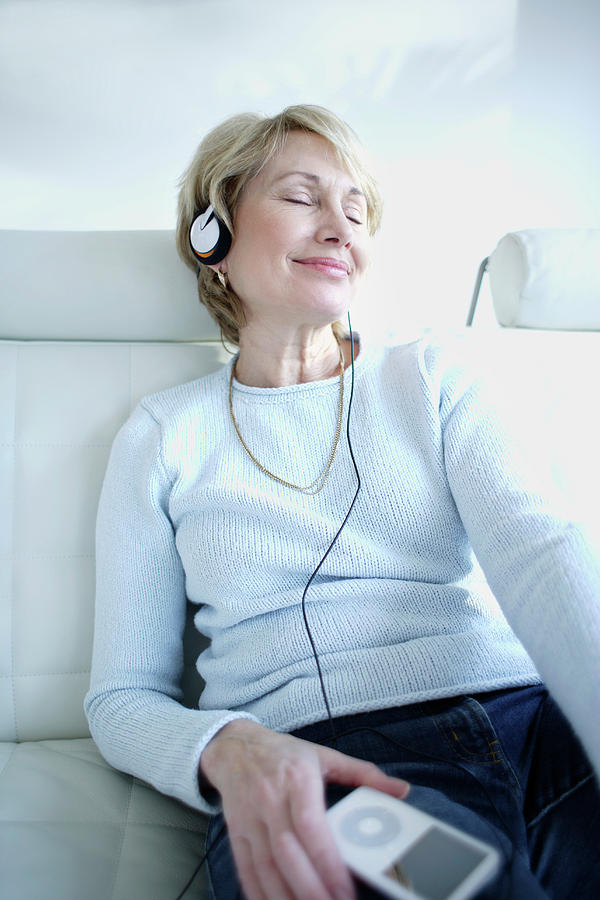 Woman Listening To Music #11 Photograph by Ian Hooton/science Photo Library