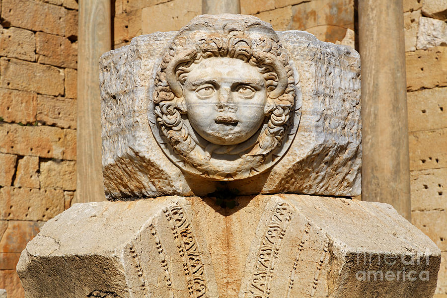 Architecture Photograph - Sculpted Medusa head at the Forum of Severus at Leptis Magna in Libya #12 by Robert Preston