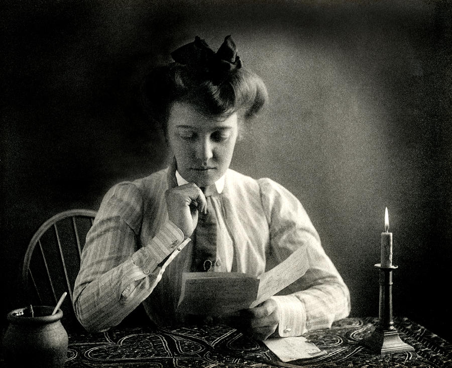 1902 Reading by Candlelight Photograph by Historic Image