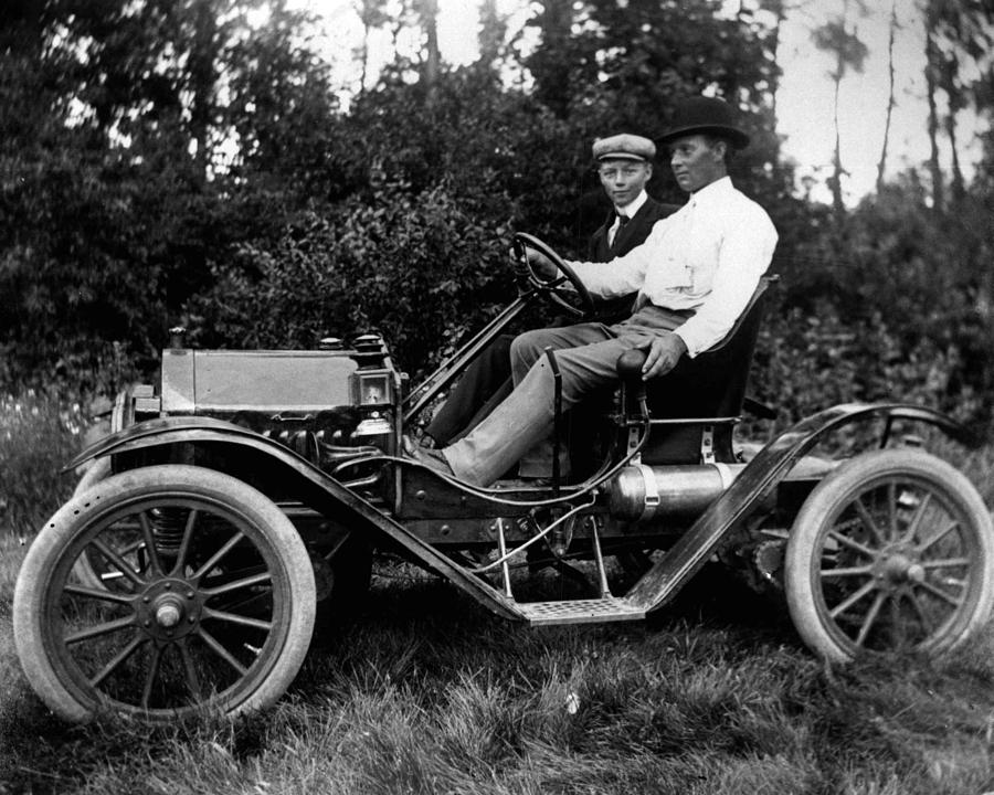 Vintage Photograph - 1912 Antique Auto Proves Better Then Horse And Carriage. by Retro Images Archive
