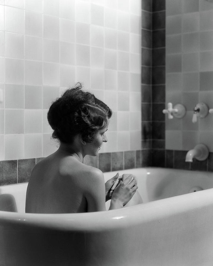 Woman in bathtub photography