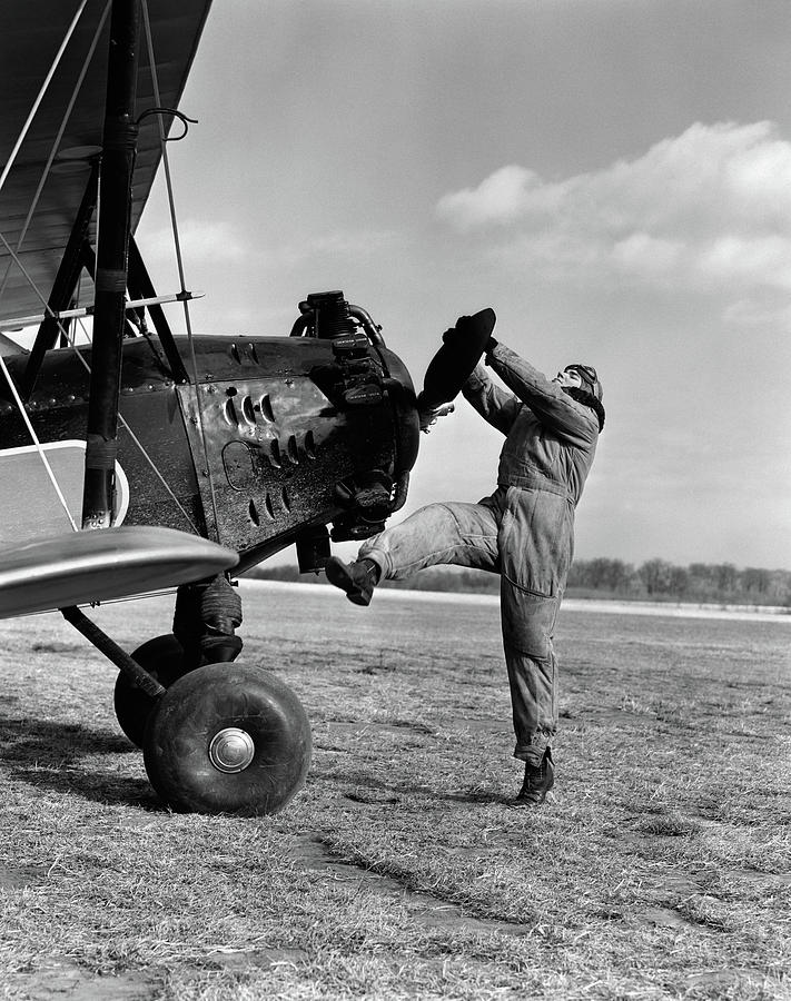 Daredevil Photograph - 1920s Male Pilot Trying To Turn Planes by Vintage Images