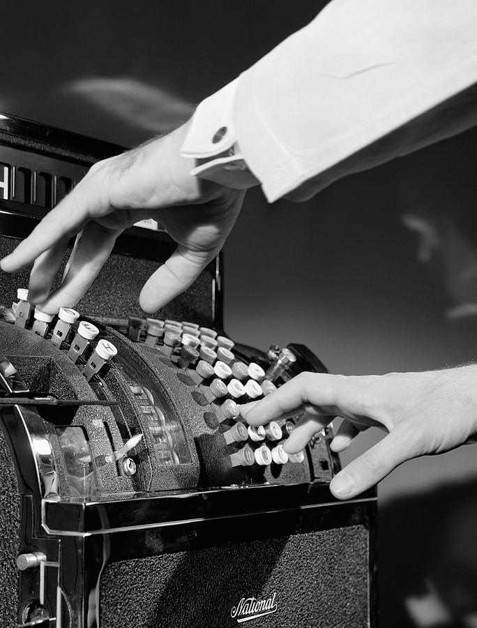 Black And White Photograph - 1930s Mans Hands Pushing Buttons by Vintage Images