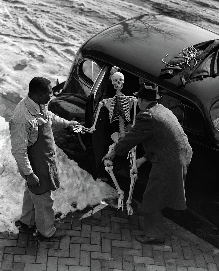 Black And White Photograph - 1930s Two Men Taking Skeleton by Vintage Images
