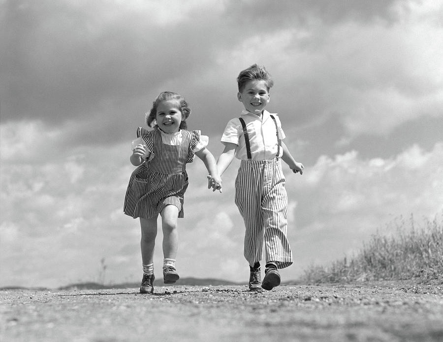 1940s Boy Girl Holding Hands Running Photograph By Vintage Images