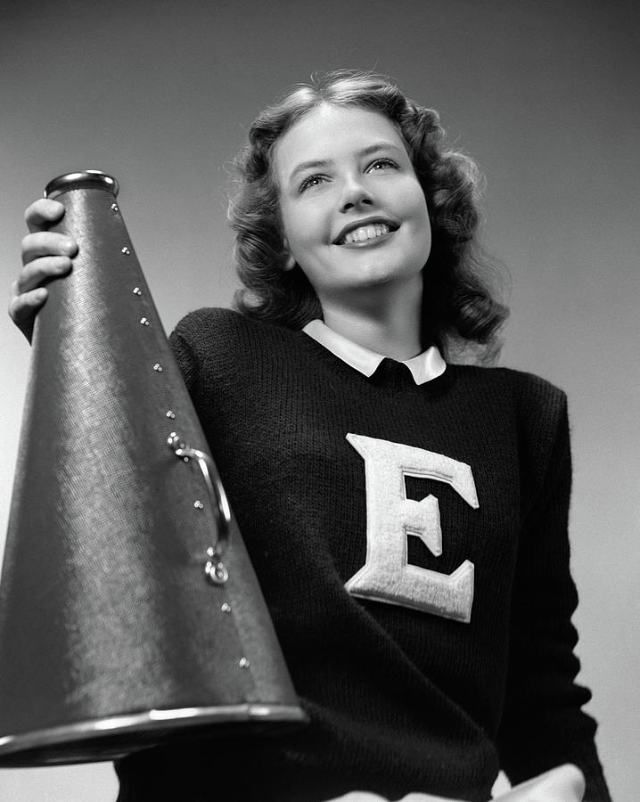 Black And White Photograph - 1940s Smiling Girl Wearing A Varsity by Vintage Images