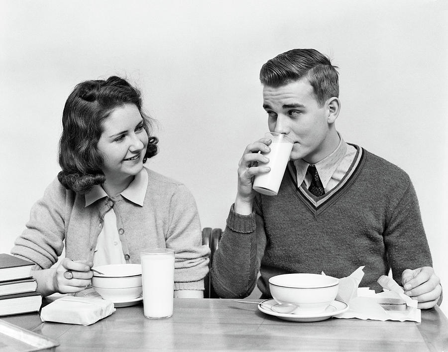 1940s Teenage Girl And Boy Eating Photograph by Vintage Images - Fine ...