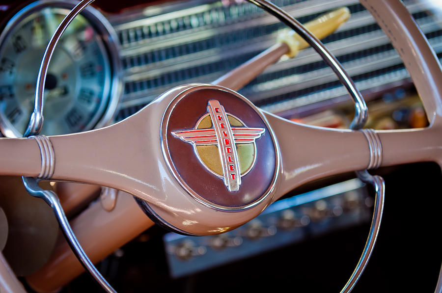 1941 Chevrolet Steering Wheel Emblem Photograph by Jill Reger